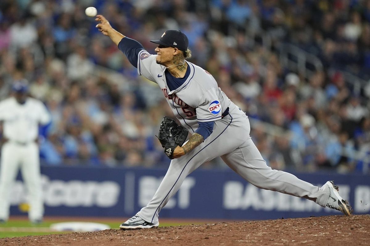 Sep 10, 2025; Toronto, Ontario, CAN; Houston Astros pitcher Bryan Abreu (52) pitches to the Toronto Blue Jays during the ninth inning at Rogers Centre. Mandatory Credit: John E. Sokolowski-Imagn Images