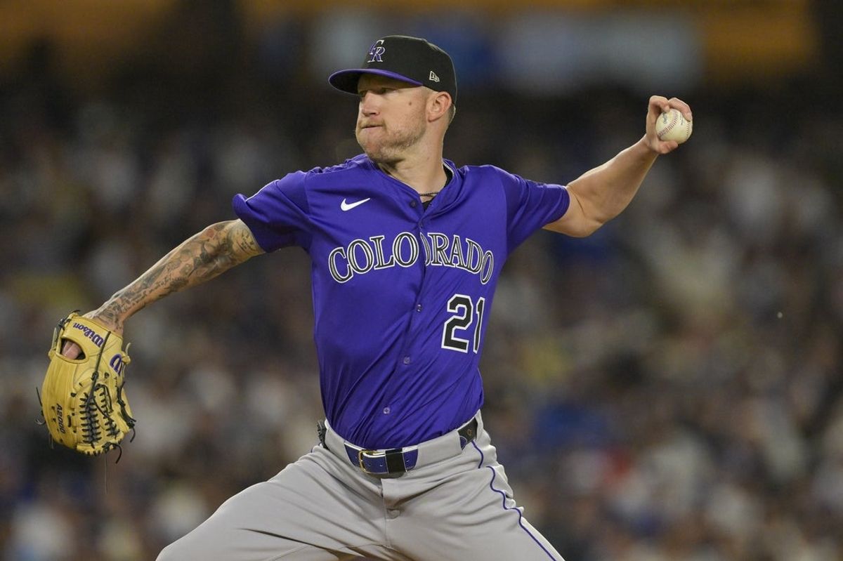 Sep 10, 2025; Los Angeles, California, USA; Colorado Rockies starting pitcher Kyle Freeland (21) throws a pitch in the first inning against the Los Angeles Dodgers at Dodger Stadium. Mandatory Credit: Jayne Kamin-Oncea-Imagn Images