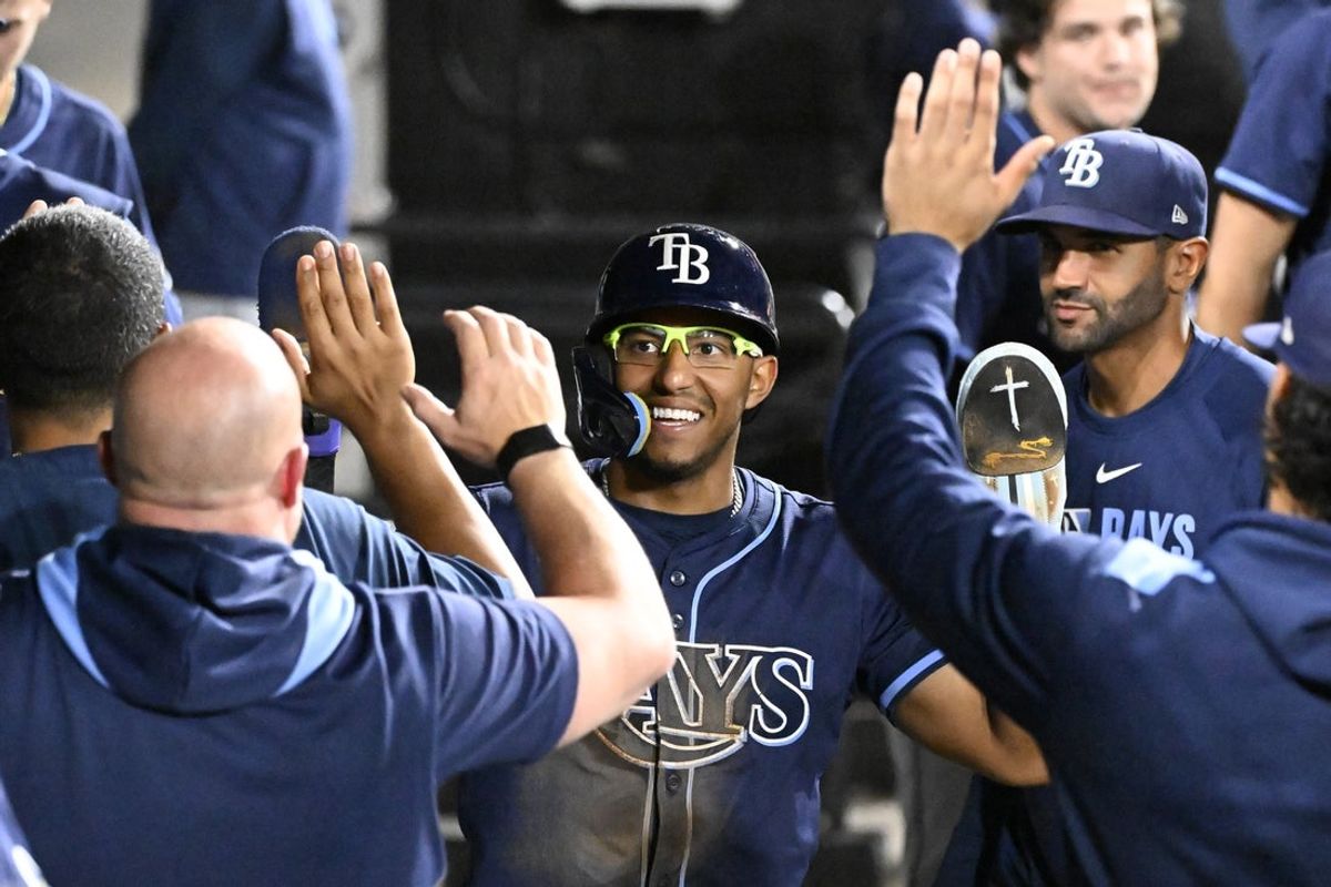 Sep 10, 2025; Chicago, Illinois, USA; Tampa Bay Rays outfielder Richie Palacios (1) celebrates in the dugout after he scores against the Chicago White Sox during the sixth inning at Rate Field. Mandatory Credit: Matt Marton-Imagn Images