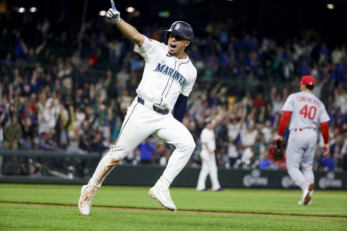 Sep 10, 2025; Seattle, Washington, USA; Seattle Mariners second baseman Leo Rivas (76) celebrates after hitting a walk-off two-run home run against the St. Louis Cardinals during during the thirteenth inning at T-Mobile Park. Mandatory Credit: Joe Nicholson-Imagn Images
