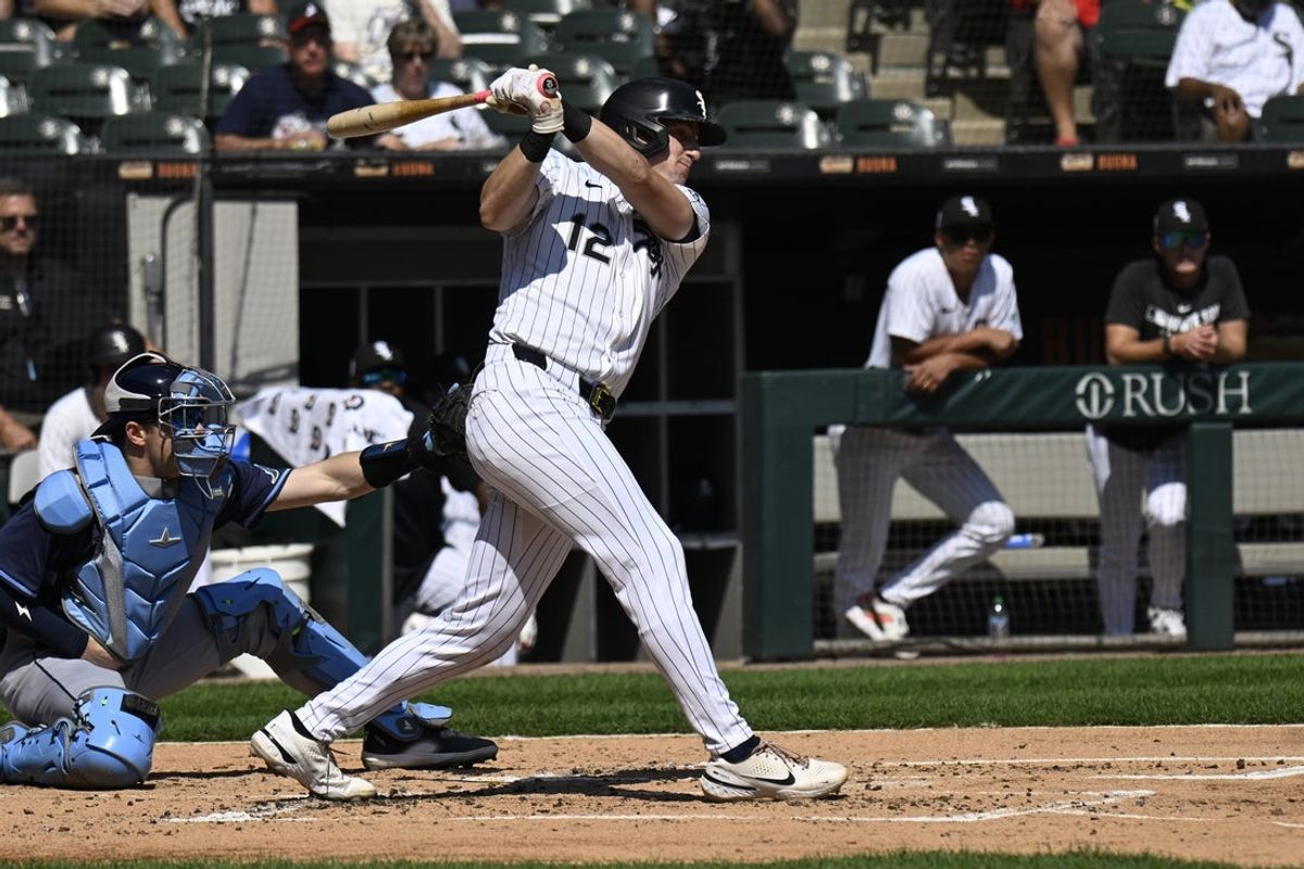 Sep 11, 2025; Chicago, Illinois, USA;  Chicago White Sox shortstop Colson Montgomery (12) hits a two-RBI single against the Tampa Bay Rays during the first inning at Rate Field. Mandatory Credit: Matt Marton-Imagn Images