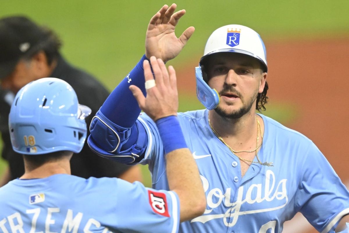 Sep 11, 2025; Cleveland, Ohio, USA; Kansas City Royals designated hitter Vinnie Pasquantino (9) celebrates his two-run home run with left fielder Mike Yastrzemski (18) in the first inning against the Cleveland Guardians at Progressive Field. Mandatory Credit: David Richard-Imagn Images
