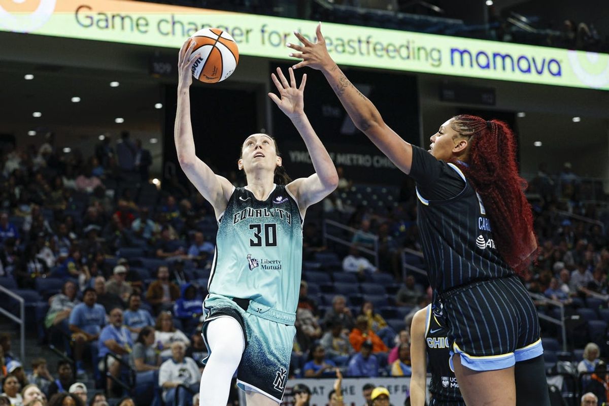 Sep 11, 2025; Chicago, Illinois, USA; New York Liberty forward Breanna Stewart (30) goes to the basket against Chicago Sky center Kamilla Cardoso (10) during the first half at Wintrust Arena. Mandatory Credit: Kamil Krzaczynski-Imagn Images