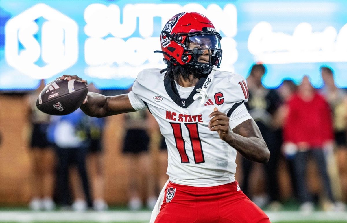 Sep 11, 2025; Winston-Salem, North Carolina, USA; North Carolina State Wolfpack quarterback CJ Bailey (11) throws a pass in first half against Wake Forest Demon Deacons at Allegacy Federal Credit Union Stadium. Mandatory Credit: Luke Jamroz-Imagn Images