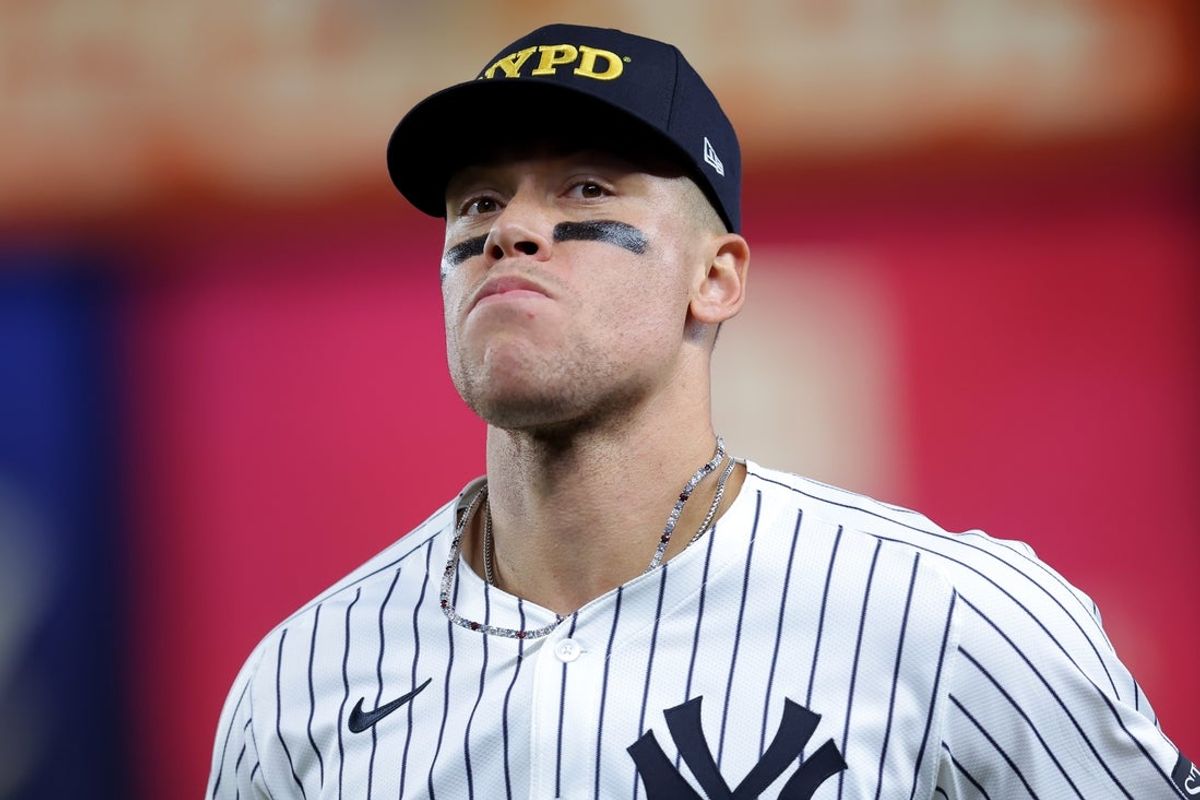 Sep 11, 2025; Bronx, New York, USA; New York Yankees right fielder Aaron Judge (99) runs in from the outfield after the top of the eighth inning against the Detroit Tigers at Yankee Stadium. Mandatory Credit: Brad Penner-Imagn Images