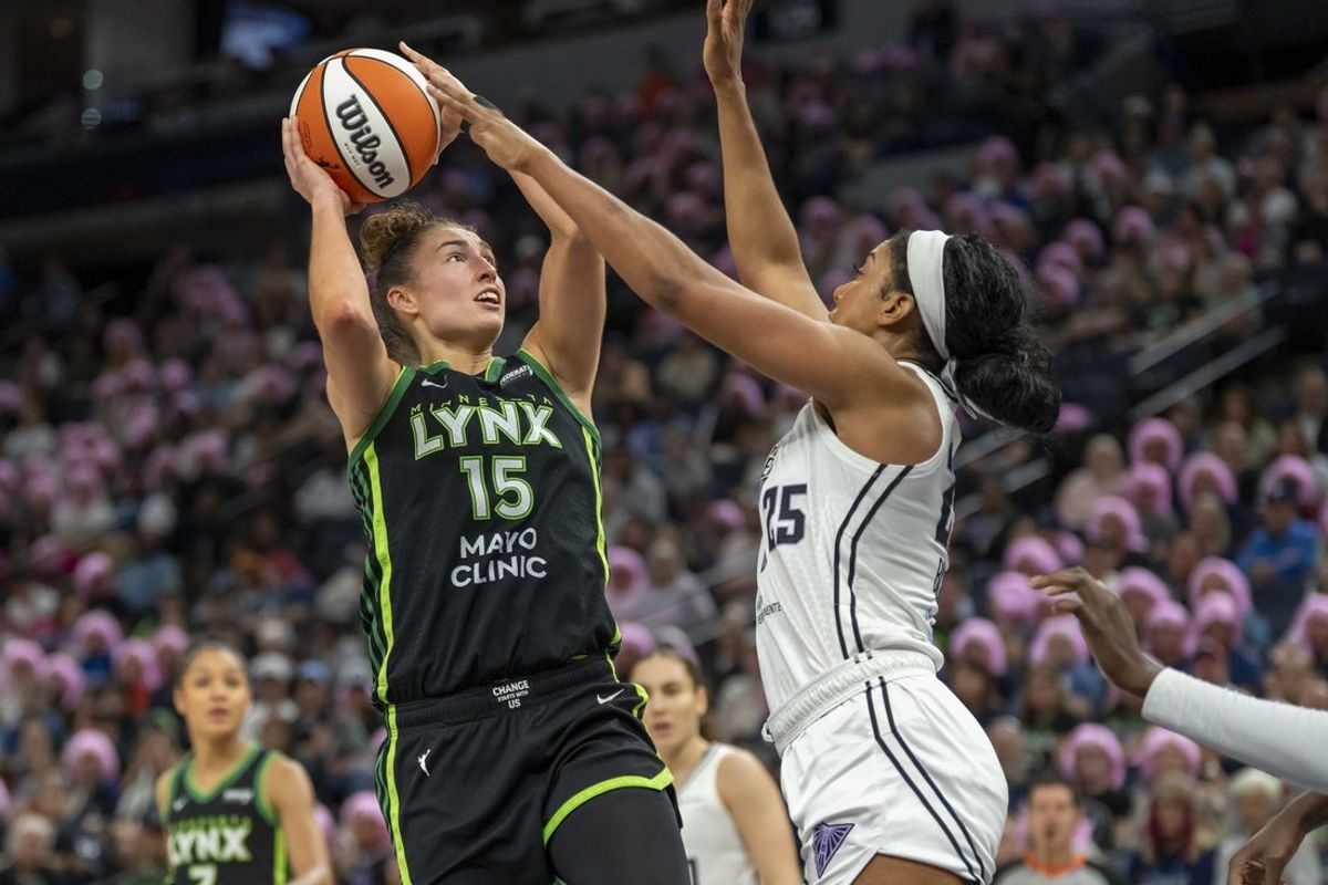 Sep 11, 2025; Minneapolis, Minnesota, USA; Minnesota Lynx forward Jessica Shepard (15) shoots over Golden State Valkyries forward Monique Billings (25) in the second half at Target Center. Mandatory Credit: Jesse Johnson-Imagn Images