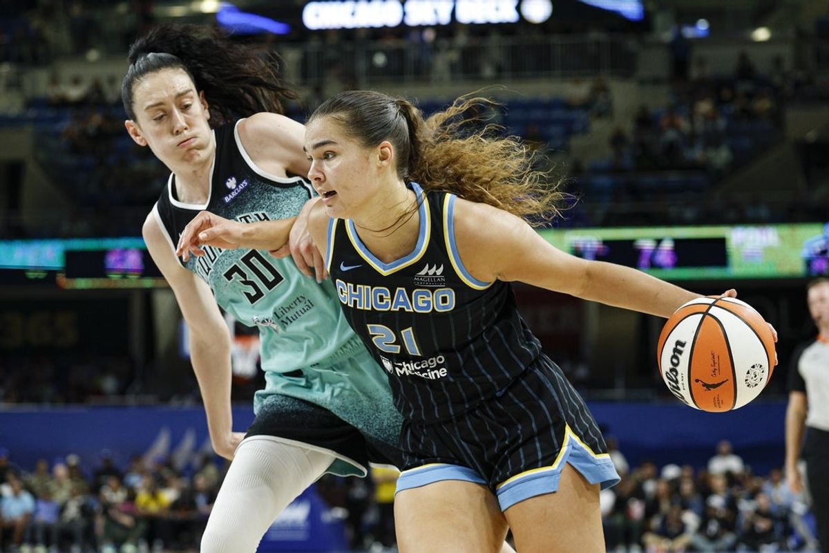 Sep 11, 2025; Chicago, Illinois, USA; Chicago Sky forward Maddy Westbeld (21) drives to the basket against New York Liberty forward Breanna Stewart (30) during the second half at Wintrust Arena. Mandatory Credit: Kamil Krzaczynski-Imagn Images