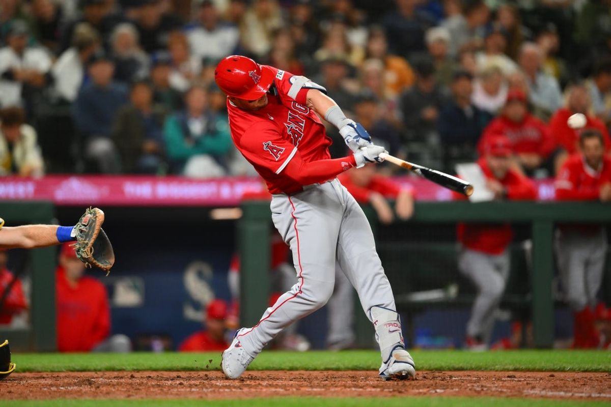 Sep 11, 2025; Seattle, Washington, USA; Los Angeles Angels designated hitter Mike Trout (27) hits a home run against the Seattle Mariners during the fifth inning at T-Mobile Park. Mandatory Credit: Steven Bisig-Imagn Images