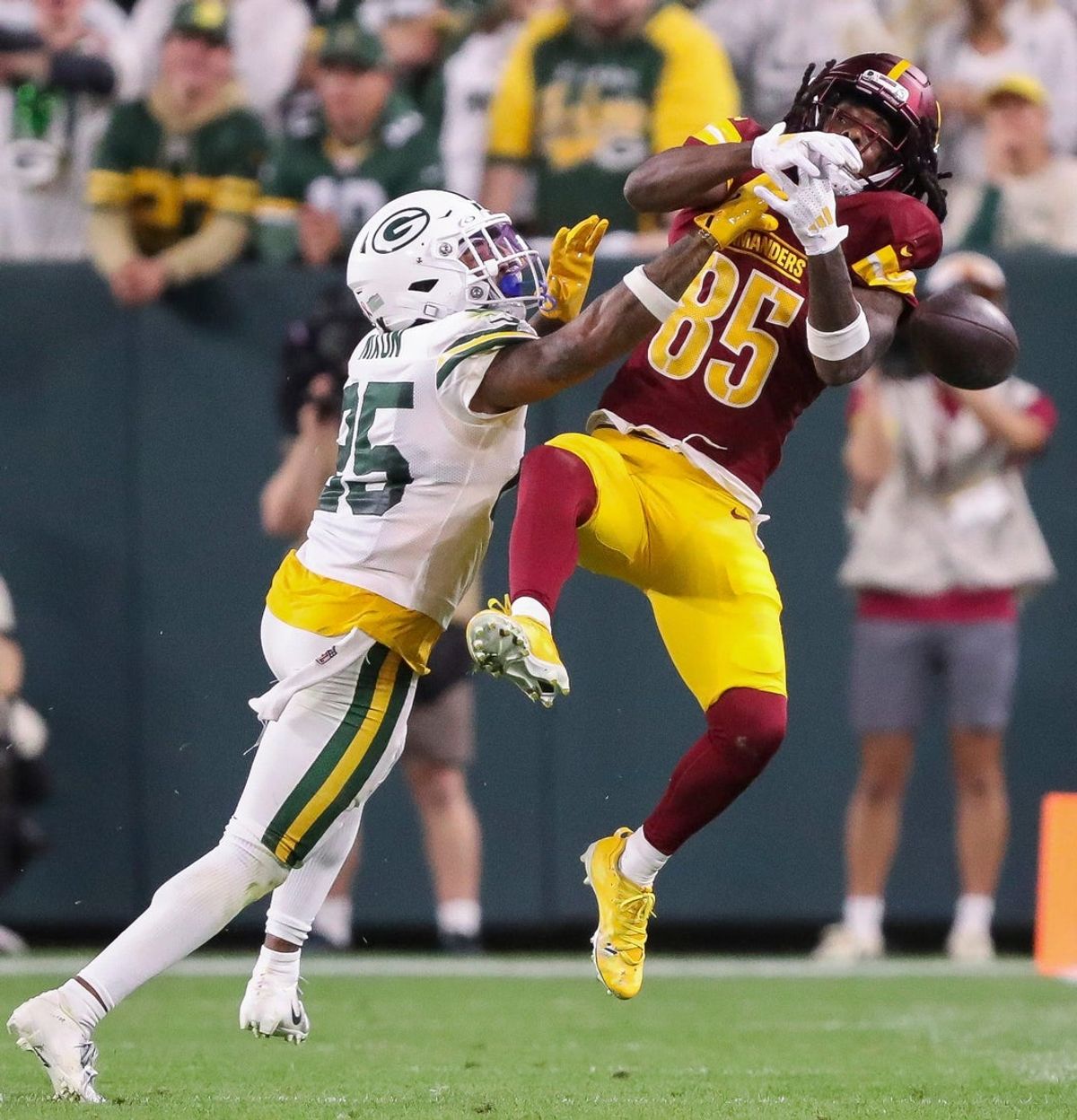 Green Bay Packers cornerback Keisean Nixon (25) breaks up a pass intended for Washington Commanders wide receiver Noah Brown (85) on Thursday, September 11, 2025, at Lambeau Field in Green Bay, Wis. The Packers won the game, 27-18.
Tork Mason/USA TODAY NETWORK-Wisconsin
