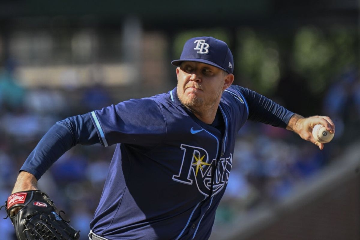 Sep 12, 2025; Chicago, Illinois, USA;  Tampa Bay Rays pitcher Garrett Cleavinger (60) delivers during the eighth inning against the Chicago Cubs at Wrigley Field. Mandatory Credit: Matt Marton-Imagn Images