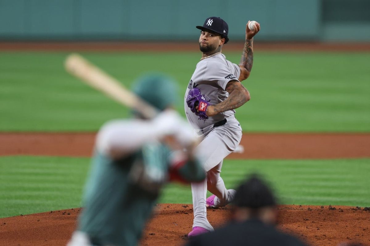 Sep 12, 2025; Boston, Massachusetts, USA; New York Yankees starting pitcher Luis Gil (81) delivers a pitch during the first inning against the Boston Red Sox at Fenway Park. Mandatory Credit: Paul Rutherford-Imagn Images