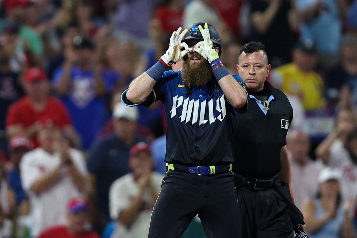 Sep 12, 2025; Philadelphia, Pennsylvania, USA; Philadelphia Phillies outfielder Brandon Marsh (16) reacts after hitting a triple against the Kansas City Royals during the third inning at Citizens Bank Park. Mandatory Credit: Bill Streicher-Imagn Images