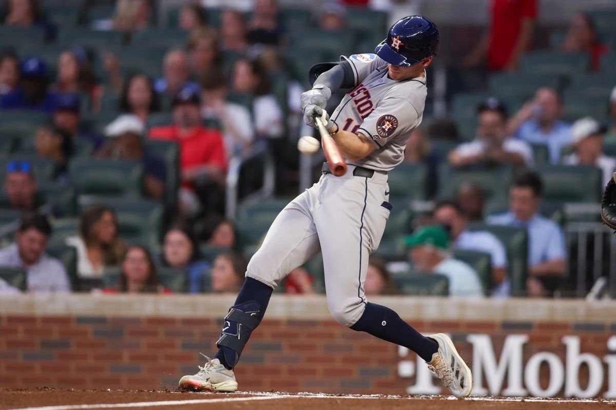 Sep 12, 2025; Atlanta, Georgia, USA; Houston Astros left fielder Zach Cole (16) hits a two-run home run against the Atlanta Braves in the third inning at Truist Park. Mandatory Credit: Brett Davis-Imagn Images