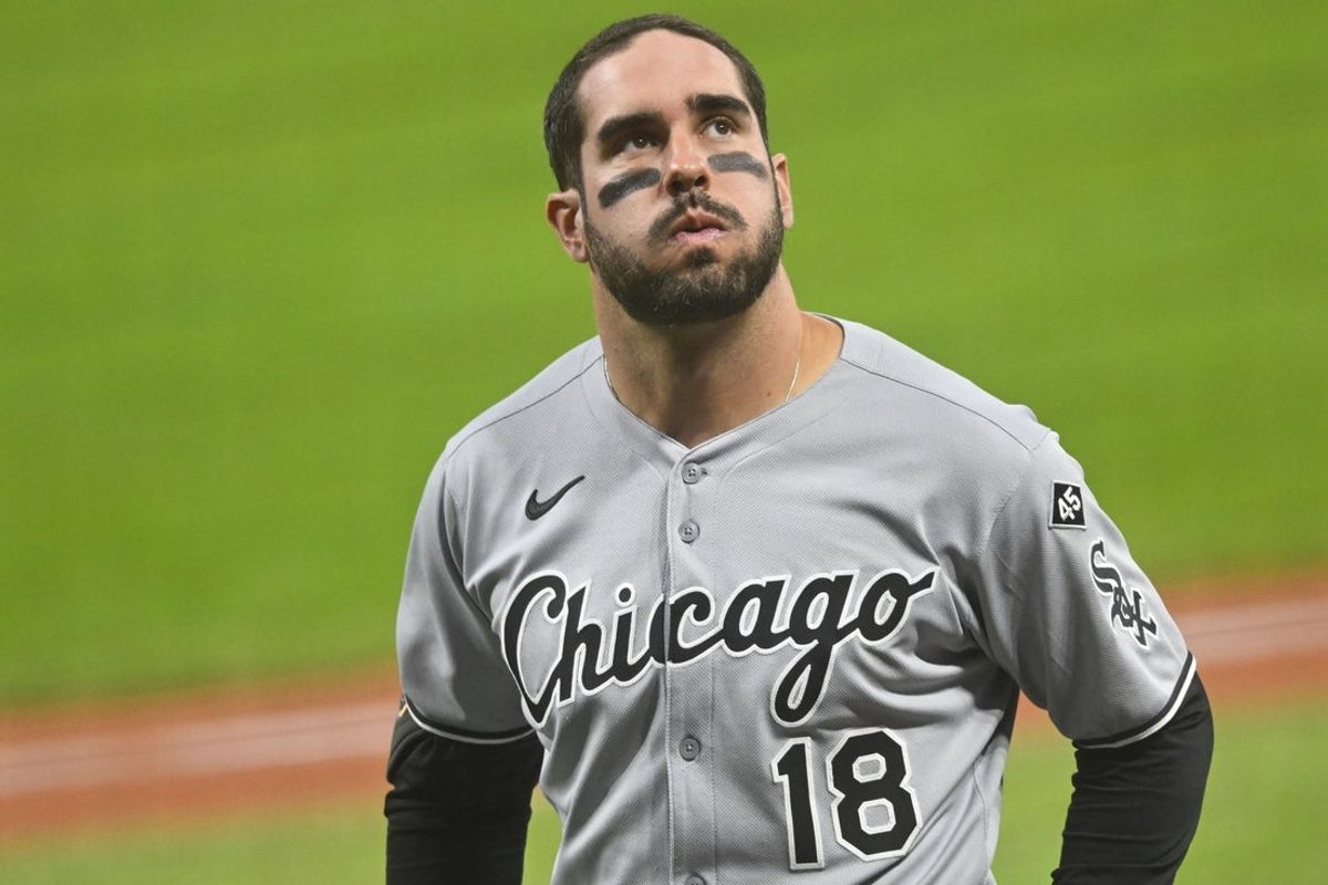 Sep 12, 2025; Cleveland, Ohio, USA; Chicago White Sox right fielder Mike Tauchman (18) reacts after getting hit with a foul ball in the third inning against the Cleveland Guardians at Progressive Field. Mandatory Credit: David Richard-Imagn Images
