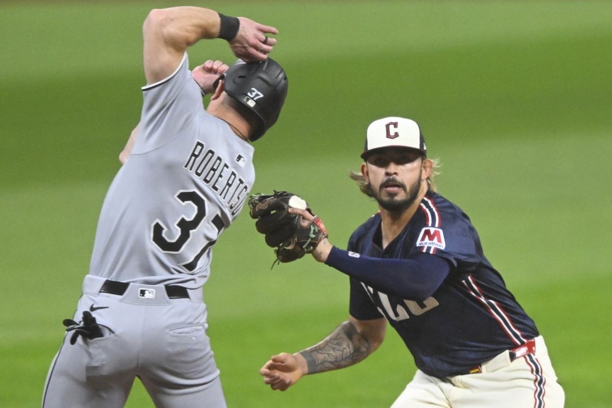 Sep 12, 2025; Cleveland, Ohio, USA; Cleveland Guardians shortstop Gabriel Arias (13) tags out Chicago White Sox left fielder Will Robertson (37) in the third inning at Progressive Field. Mandatory Credit: David Richard-Imagn Images