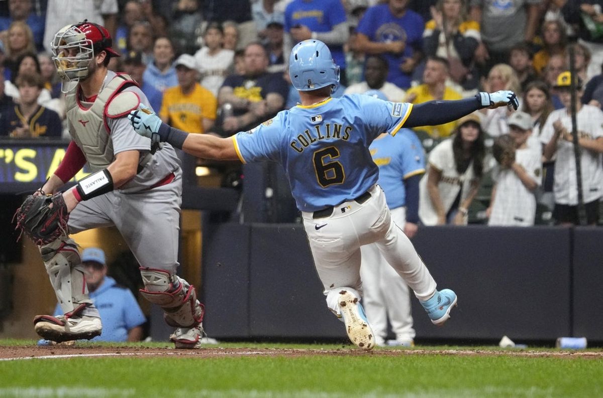 Sep 12, 2025; Milwaukee, Wisconsin, USA; Milwaukee Brewers outfielder Isaac Collins (6) slides in safely for a run against St. Louis Cardinals catcher Jimmy Crooks (8) in the fourth inning at American Family Field. Mandatory Credit: Michael McLoone-Imagn Images