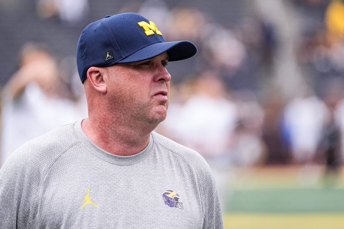 Michigan offensive coordinator Chip Lindsey watches warm up ahead of the Central Michigan game at Michigan Stadium in Ann Arbor on Saturday, Sept. 13, 2025.