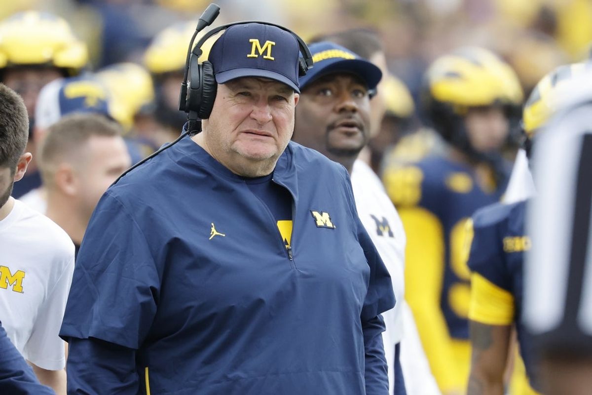 Sep 13, 2025; Ann Arbor, Michigan, USA;  Michigan Wolverines assistant head coach Biff Poggi on the sideline in the first half against the Central Michigan Chippewas at Michigan Stadium. Mandatory Credit: Rick Osentoski-Imagn Images