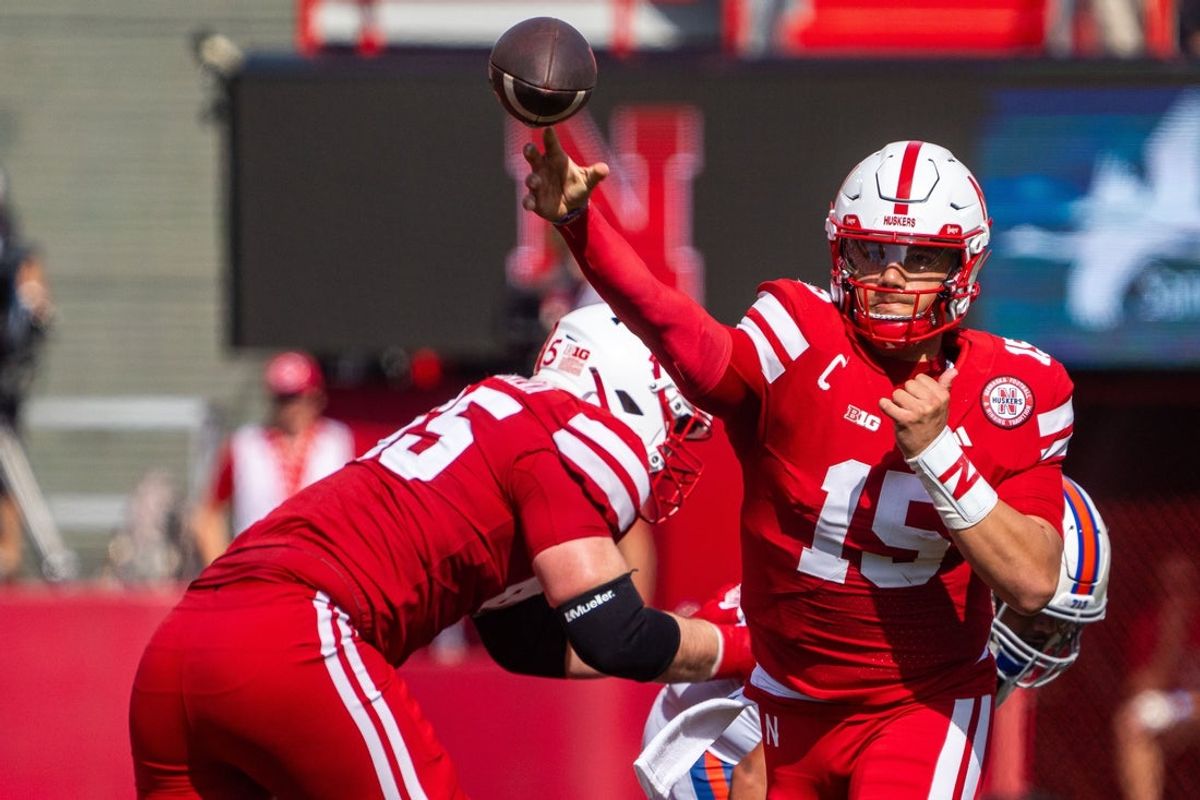 Sep 13, 2025; Lincoln, Nebraska, USA; Nebraska Cornhuskers quarterback Dylan Raiola (15) passes against the Houston Christian Huskies during the first quarter at Memorial Stadium. Mandatory Credit: Dylan Widger-Imagn Images