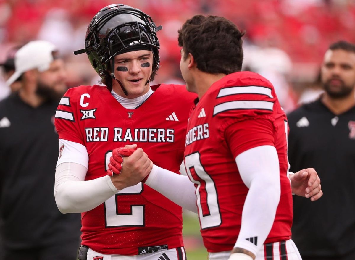 Texas Tech's Behren Morton (left) talks to Jacob Rodriguez prior to a non-conference football game, Saturday, Sept. 13, 2025, at Jones AT&T Stadium.