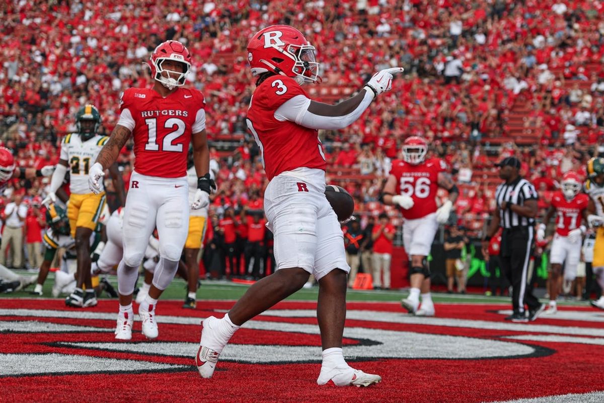 Sep 13, 2025; Piscataway, New Jersey, USA; Rutgers Scarlet Knights running back Antwan Raymond (3) scores a rushing touchdown during the first half against the Norfolk State Spartans at SHI Stadium. Mandatory Credit: Vincent Carchietta-Imagn Images