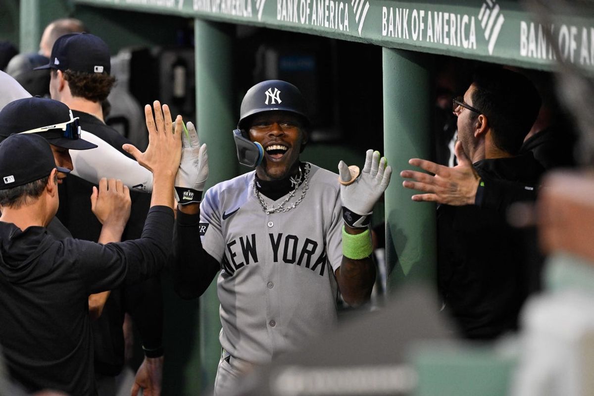 Sep 13, 2025; Boston, Massachusetts, USA; New York Yankees second baseman Jazz Chisholm Jr. (13) celebrates his one run home run in the dugout during fifth inning inning against the Boston Red Sox at Fenway Park. Mandatory Credit: Eric Canha-Imagn Images