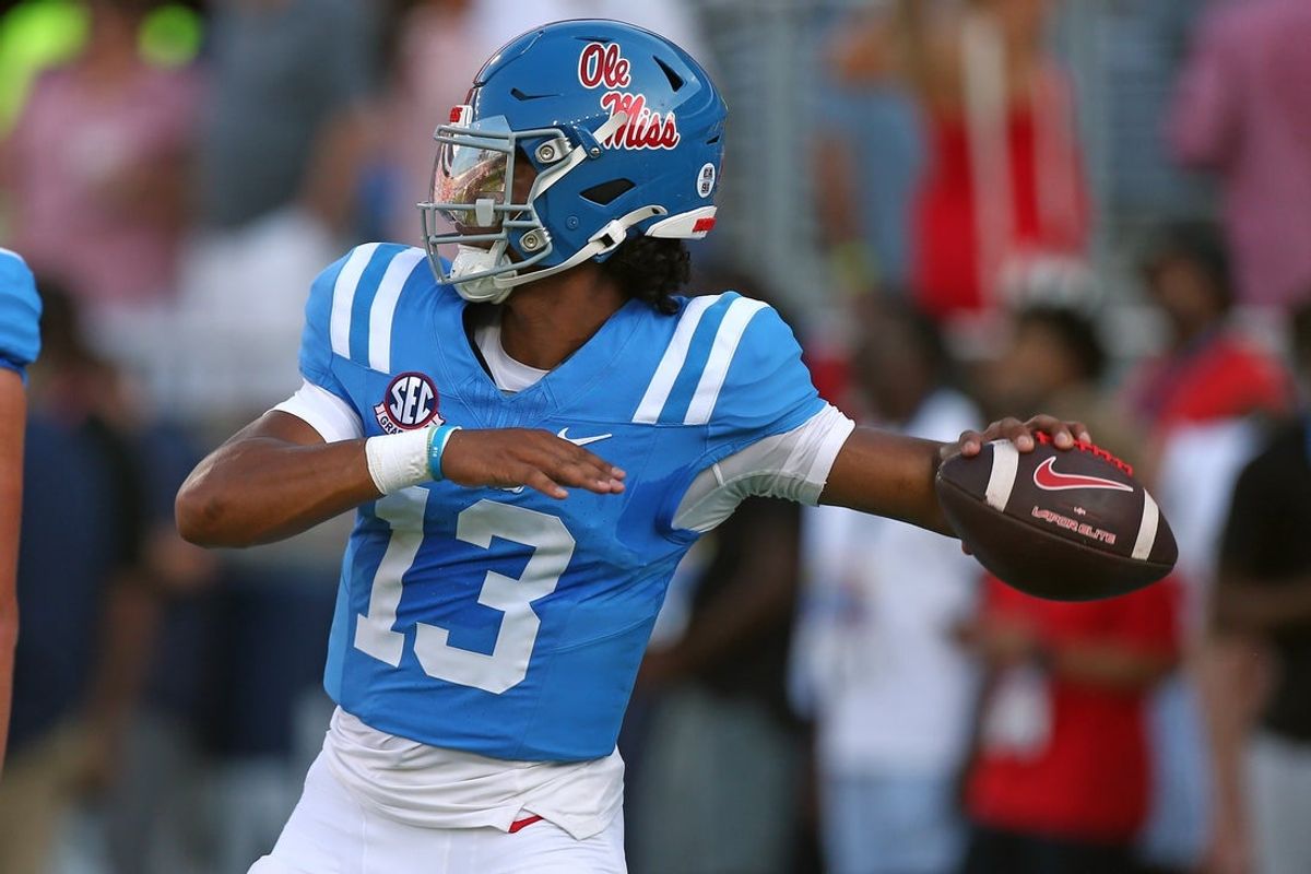 8Sep 13, 2025; Oxford, Mississippi, USA; Mississippi Rebels quarterback Austin Simmons (13) passes the ball during warm ups prior to the game against the Arkansas Razorback at Vaught-Hemingway Stadium. Mandatory Credit: Petre Thomas-Imagn Images