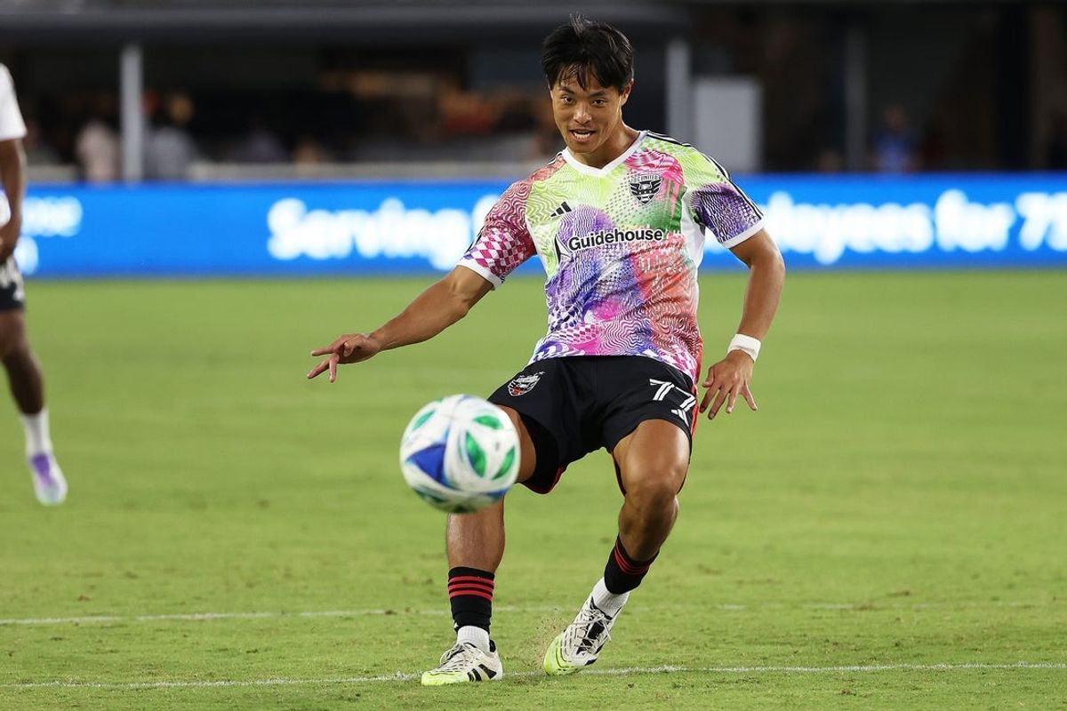 Sep 13, 2025; Washington, District of Columbia, USA; D.C. United midfielder Hosei Kijima (77) takes a shot before a game against Orlando City at Audi Field. Mandatory Credit: Daniel Kucin Jr.-Imagn Images