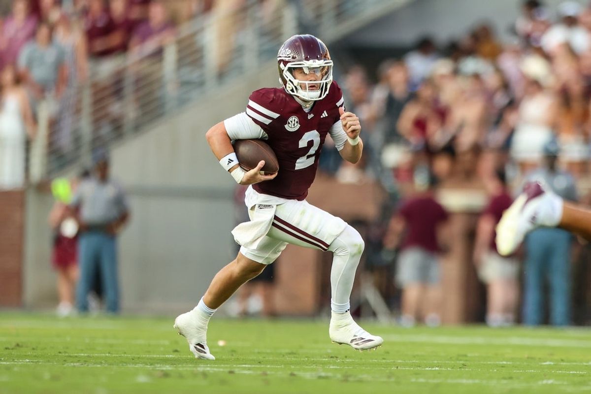 Sep 13, 2025; Starkville, Mississippi, USA; Mississippi State Bulldogs quarterback Blake Shapen (2) scrambles with the ball during the first half against the Alcorn State Braves at Davis Wade Stadium at Scott Field. Mandatory Credit: Wesley Hale-Imagn Images
