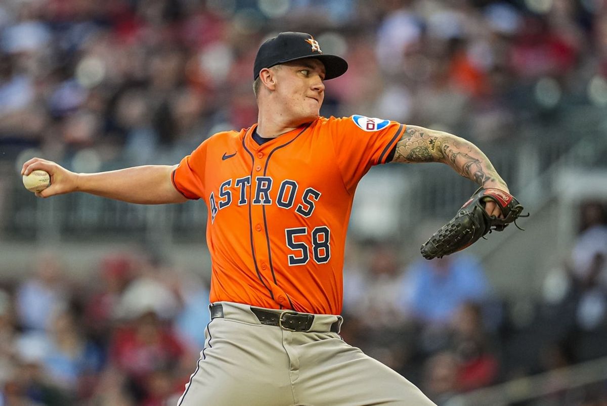 Sep 13, 2025; Cumberland, Georgia, USA; Houston Astros starting pitcher Hunter Brown (58) pitches against the Atlanta Braves during the first inning at Truist Park. Mandatory Credit: Dale Zanine-Imagn Images