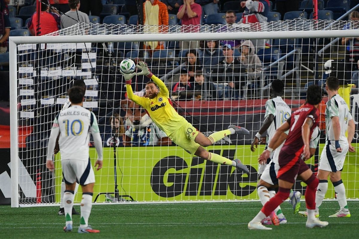 Sep 13, 2025; Foxborough, Massachusetts, USA; New England Revolution goalkeeper Matt Turner (30) makes a save during the first half against Toronto FC at Gillette Stadium. Mandatory Credit: Bob DeChiara-Imagn Images