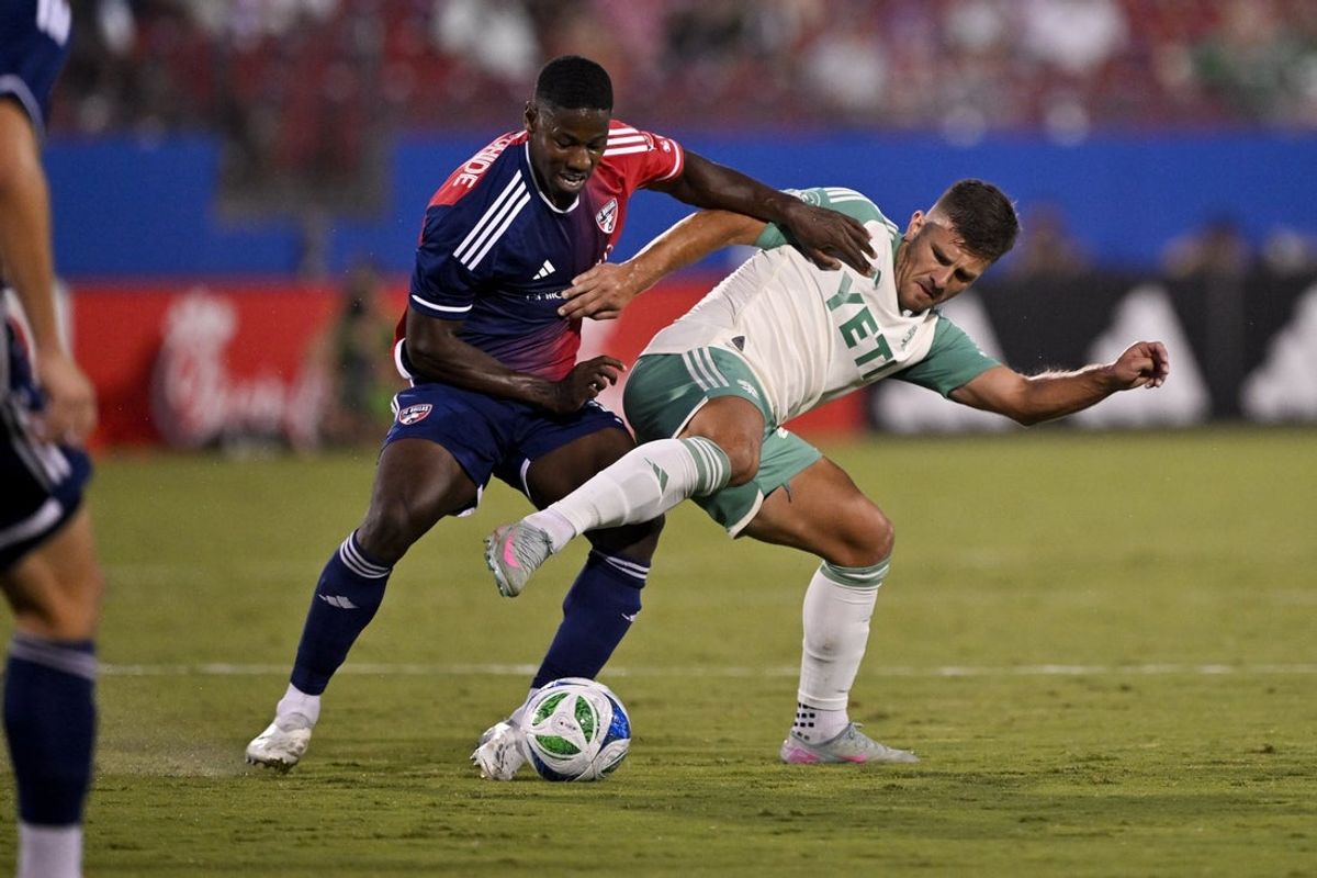 Sep 13, 2025; Frisco, Texas, USA; FC Dallas defender Osaze Urhoghide (3) and Austin FC forward Diego Rubio (21) battle for control of the ball during the first half at Toyota Stadium. Mandatory Credit: Jerome Miron-Imagn Images