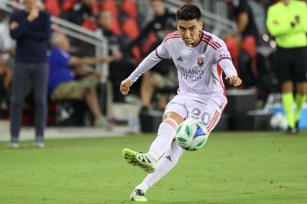 Sep 13, 2025; Washington, District of Columbia, USA; Orlando City midfielder Eduard Atuesta (20) takes a shot during the second half against D.C. United at Audi Field. Mandatory Credit: Daniel Kucin Jr.-Imagn Images