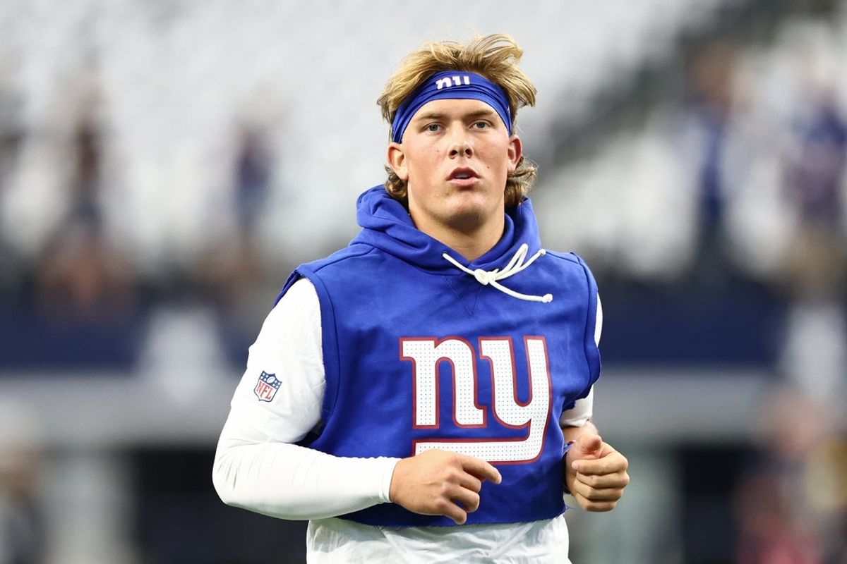 Sep 14, 2025; Arlington, Texas, USA; New York Giants quarterback Jaxson Dart (6) warms up before the game against the Dallas Cowboys at AT&T Stadium. Mandatory Credit: Kevin Jairaj-Imagn Images