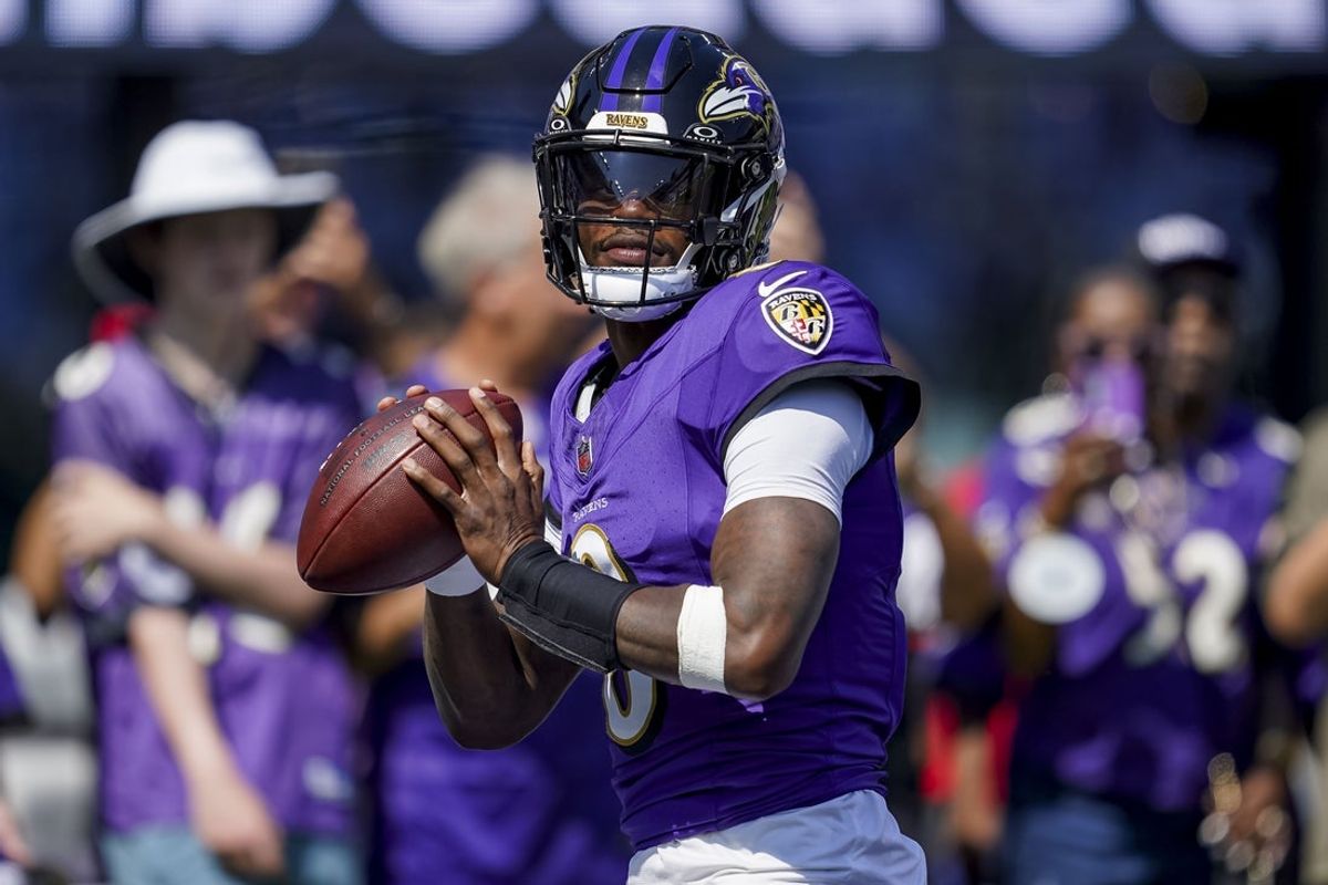 Sep 14, 2025; Baltimore, Maryland, USA; Baltimore Ravens quarterback Lamar Jackson (8) warms up before the game against the Cleveland Browns at M&T Bank Stadium. Mandatory Credit: Mitch Stringer-Imagn Images