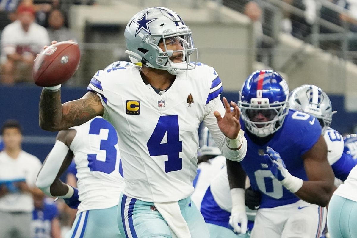 Sep 14, 2025; Arlington, Texas, USA; Dallas Cowboys quarterback Dak Prescott (4) looks to pass the ball against the New York Giants during the first quarter at AT&T Stadium. Mandatory Credit: Raymond Carlin III-Imagn Images