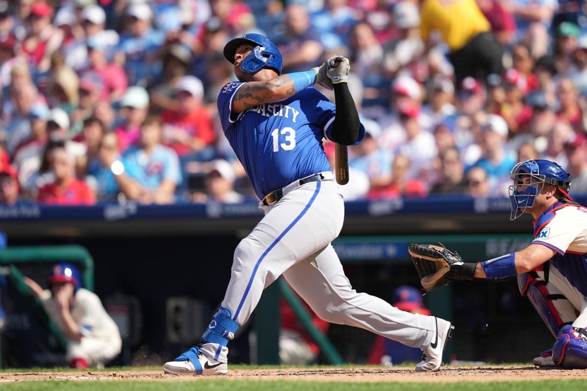 Sep 14, 2025; Philadelphia, Pennsylvania, USA; Kansas City Royals catcher Salvador Perez (13) hits a three-run home run against the Philadelphia Phillies in the sixth inning at Citizens Bank Park. Mandatory Credit: Kyle Ross-Imagn Images