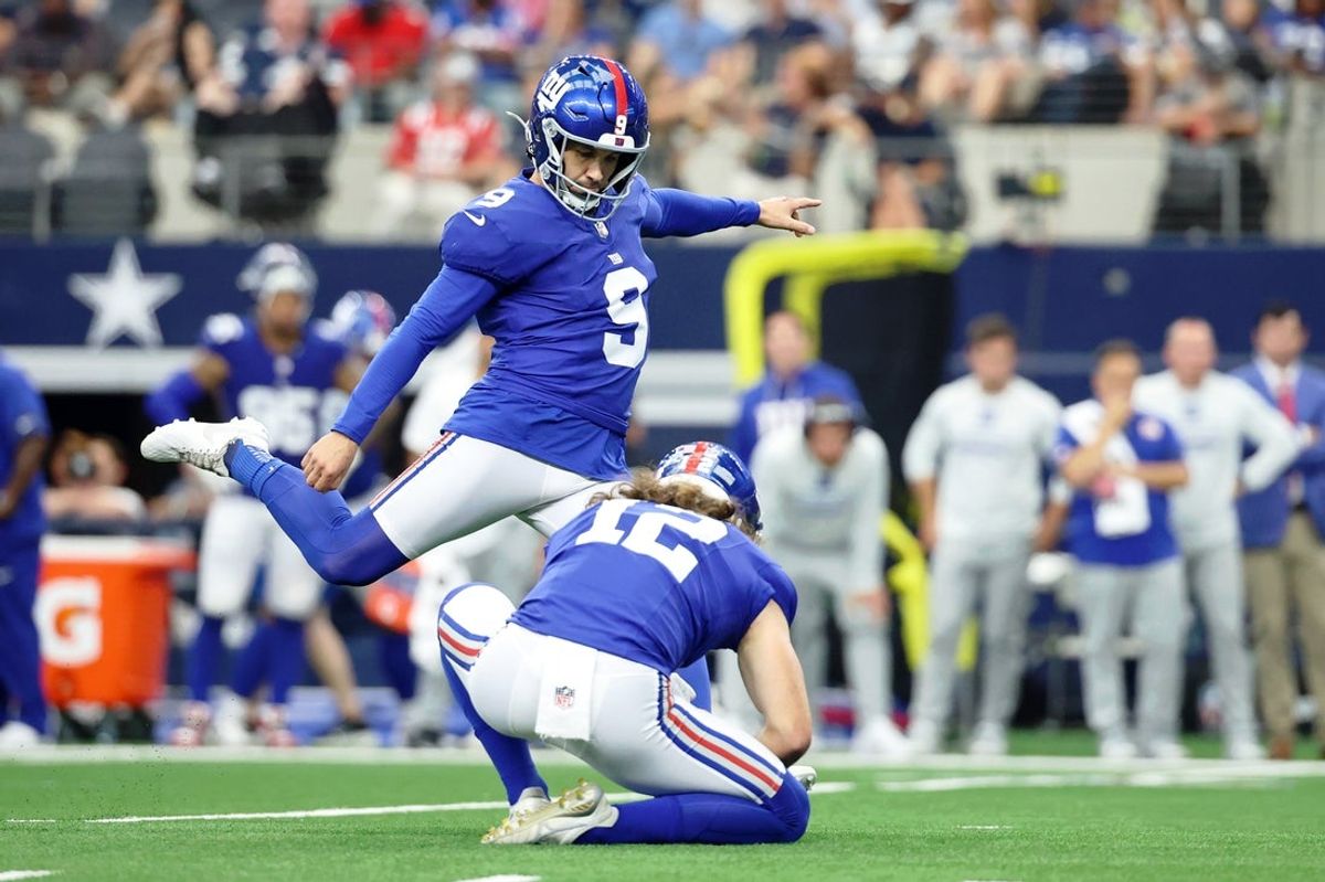 Sep 14, 2025; Arlington, Texas, USA; New York Giants place kicker Graham Gano (9) attempts a field goal against the Dallas Cowboys during the third quarter at AT&T Stadium. Mandatory Credit: Kevin Jairaj-Imagn Images