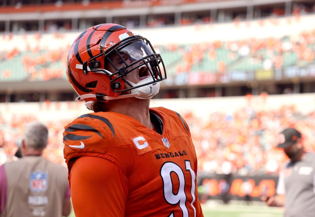Sep 14, 2025; Cincinnati, Ohio, USA;  Cincinnati Bengals defensive end Trey Hendrickson (91) celebrates the win after the game against the Jacksonville Jaguars at Paycor Stadium. Mandatory Credit: Joseph Maiorana-Imagn Images