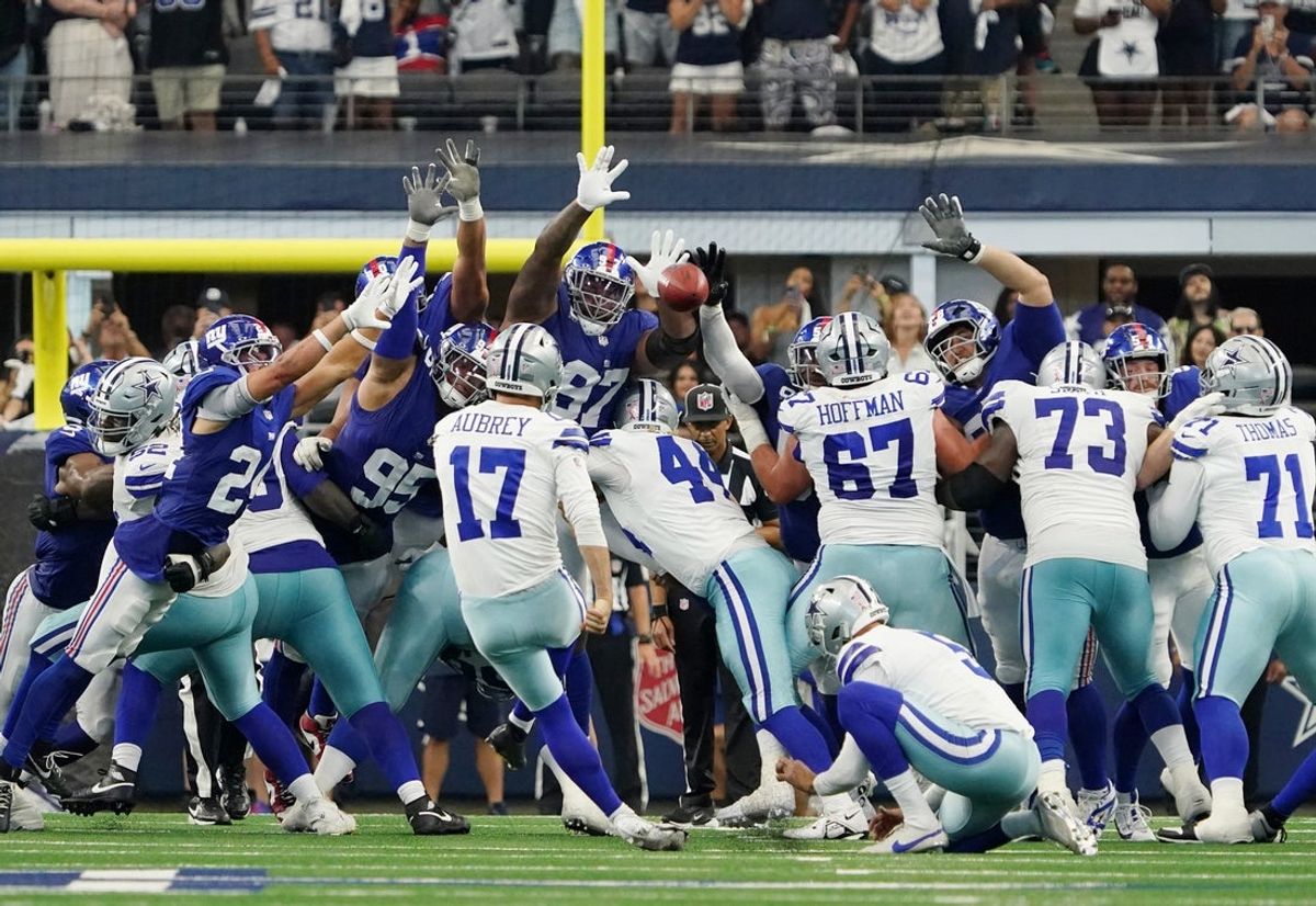Sep 14, 2025; Arlington, Texas, USA; Dallas Cowboys place kicker Brandon Aubrey (17) makes a game-winning field goal against the New York Giants during overtime at AT&T Stadium. Mandatory Credit: Raymond Carlin III-Imagn Images