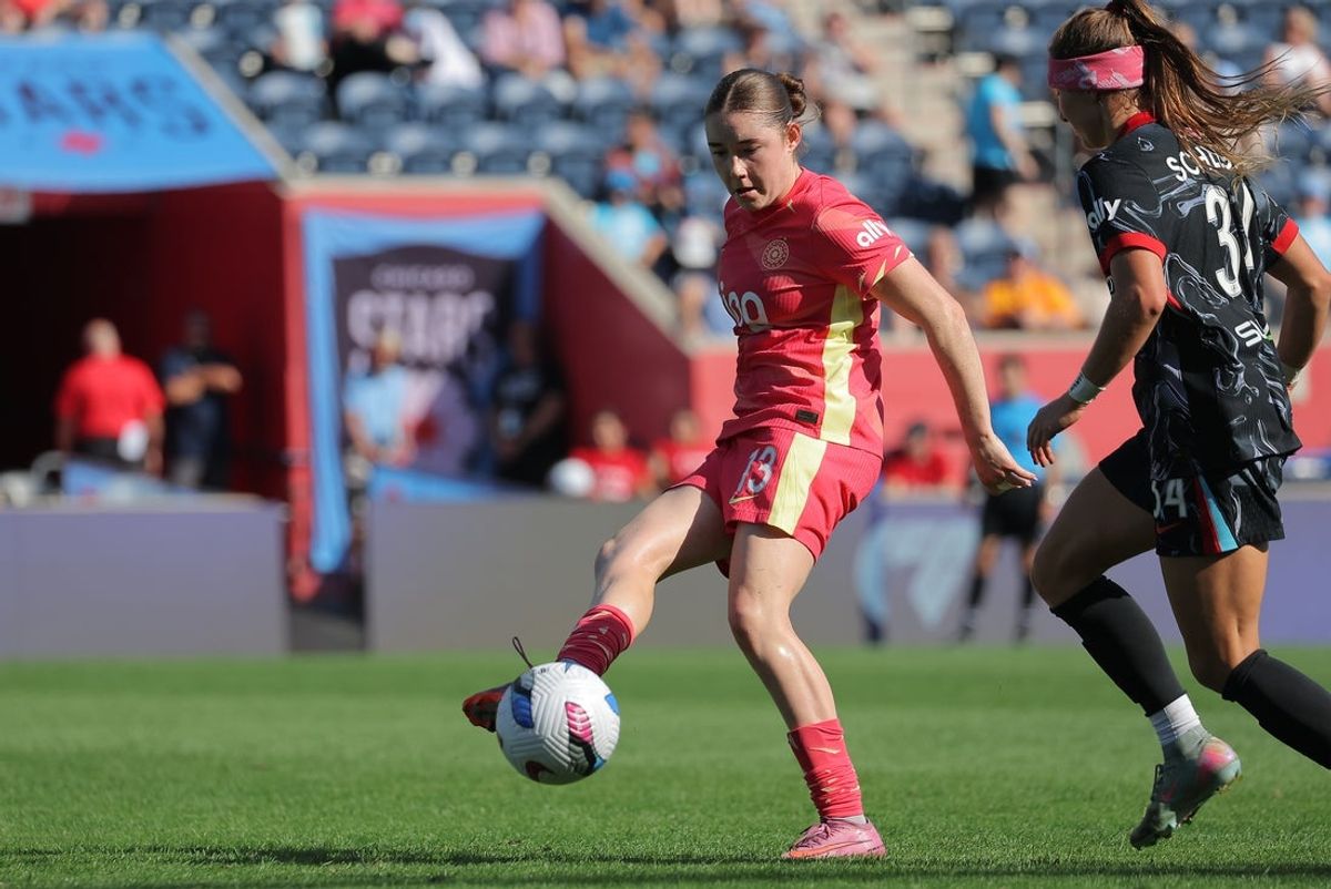 Sep 14, 2025; Bridgeview, Illinois, USA; Portland Thorns FC midfielder Olivia Moultrie (13) passes the ball during the second half of a match against the Chicago Stars FC at SeatGeek Stadium. Mandatory Credit: Melissa Tamez-Imagn Images