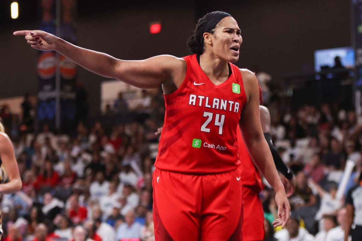 Sep 14, 2025; College Park, Georgia, USA; Atlanta Dream forward Brionna Jones (24) reacts to a call against the Indiana Fever in the third quarter during game one of round one for the 2025 WNBA Playoffs at Gateway Center Arena at College Park. Mandatory Credit: Brett Davis-Imagn Images