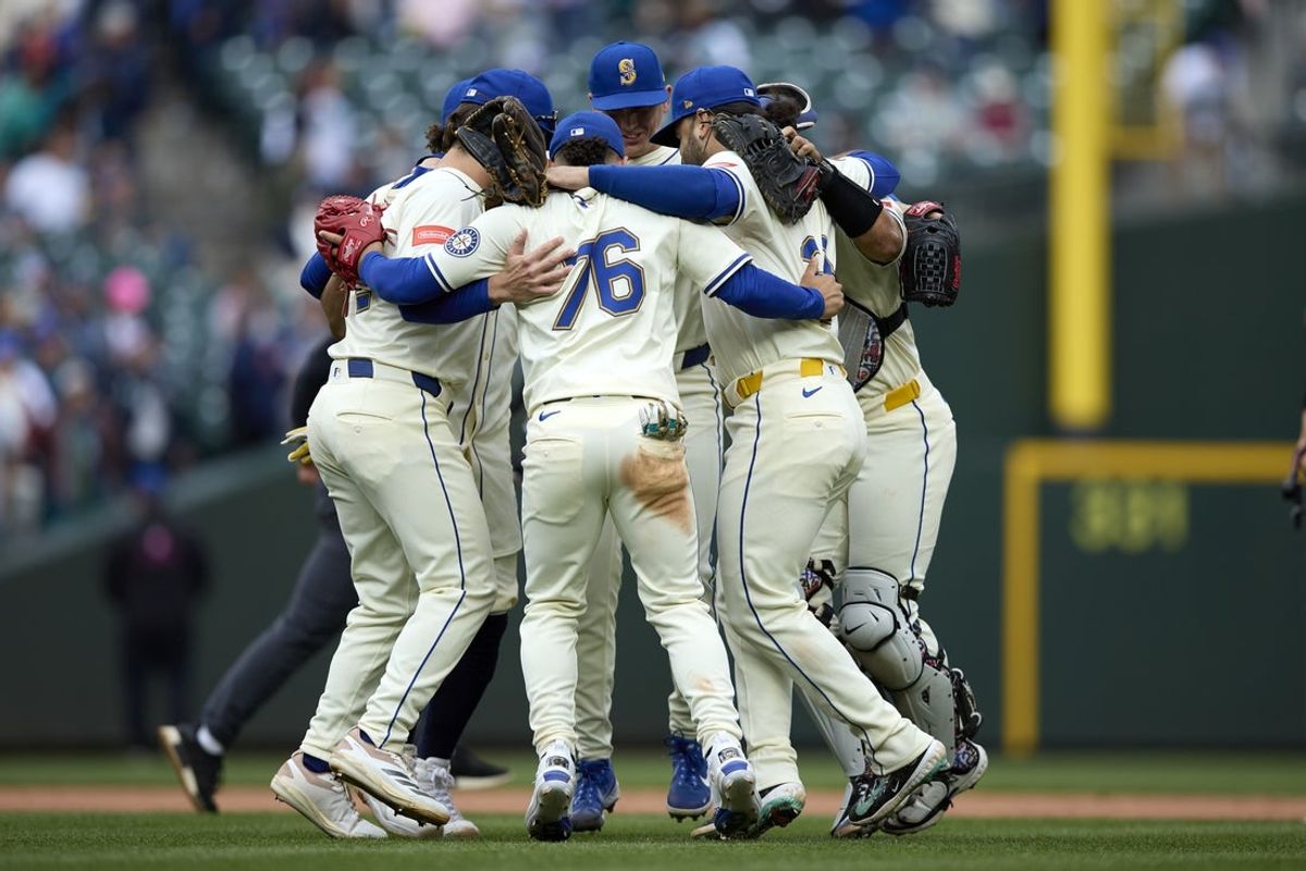 Sep 14, 2025; Seattle, Washington, USA; Seattle Mariners players dance after the win over the Los Angeles Angels at T-Mobile Park. Mandatory Credit: John Froschauer-Imagn Images