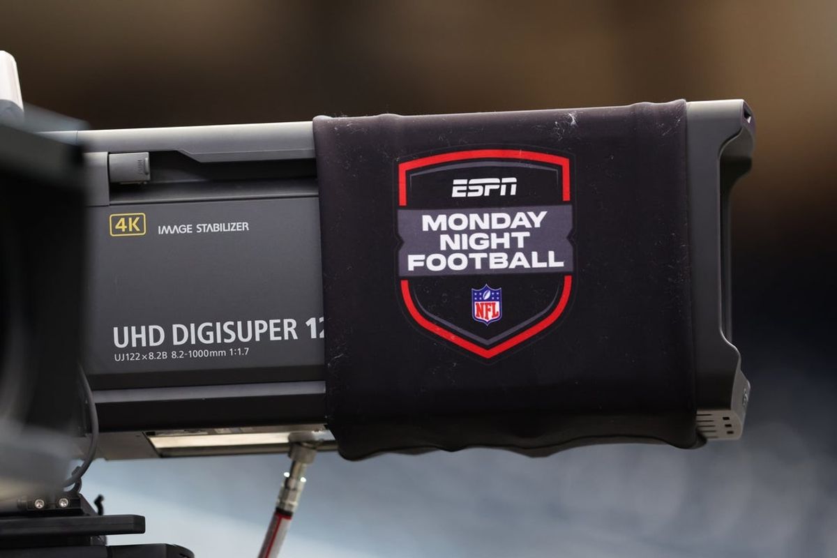 Sep 15, 2025; Houston, Texas, USA; A broadcast camera is wrapped in a Monday Night Football logo before the game between the Houston Texans and the Tampa Bay Buccaneers at NRG Stadium. Mandatory Credit: Troy Taormina-Imagn Images