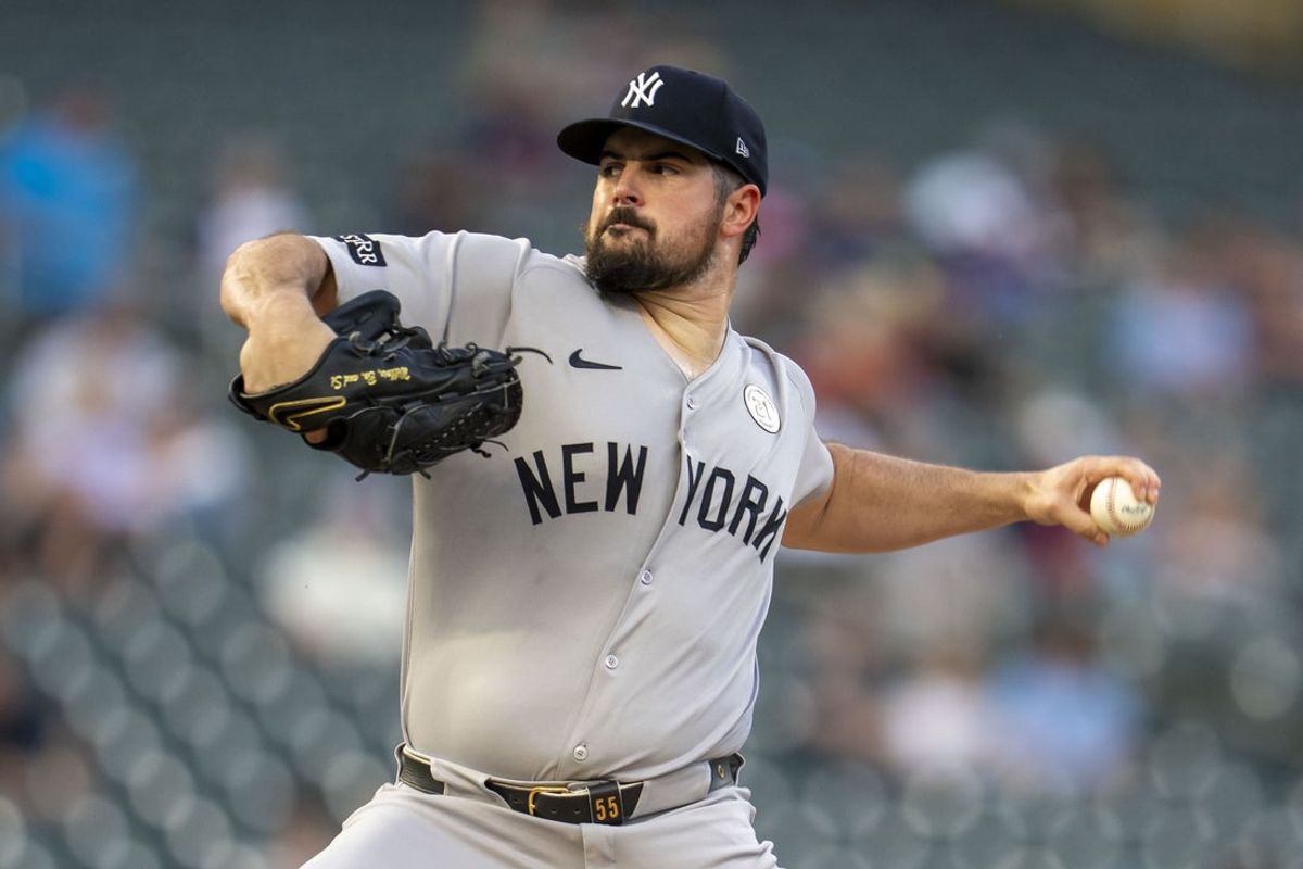 Sep 15, 2025; Minneapolis, Minnesota, USA; New York Yankees starting pitcher Carlos Rodon (55) delivers a pitch against the Minnesota Twins in the first inning at Target Field. Mandatory Credit: Jesse Johnson-Imagn Images