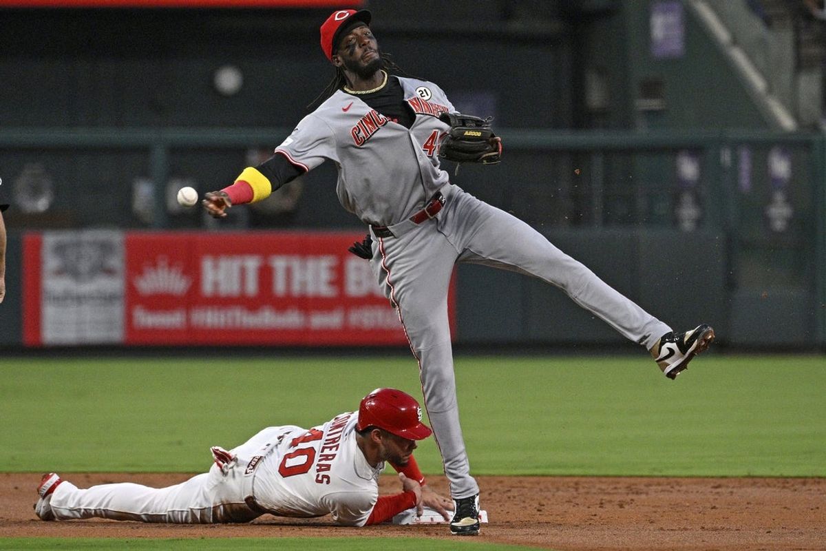 Sep 15, 2025; St. Louis, Missouri, USA; Cincinnati Reds shortstop Elly De La Cruz (44) throws out St. Louis Cardinals right fielder Lars Nootbaar (not pictured) at first base in the second inning at Busch Stadium. Mandatory Credit: Joe Puetz-Imagn Images