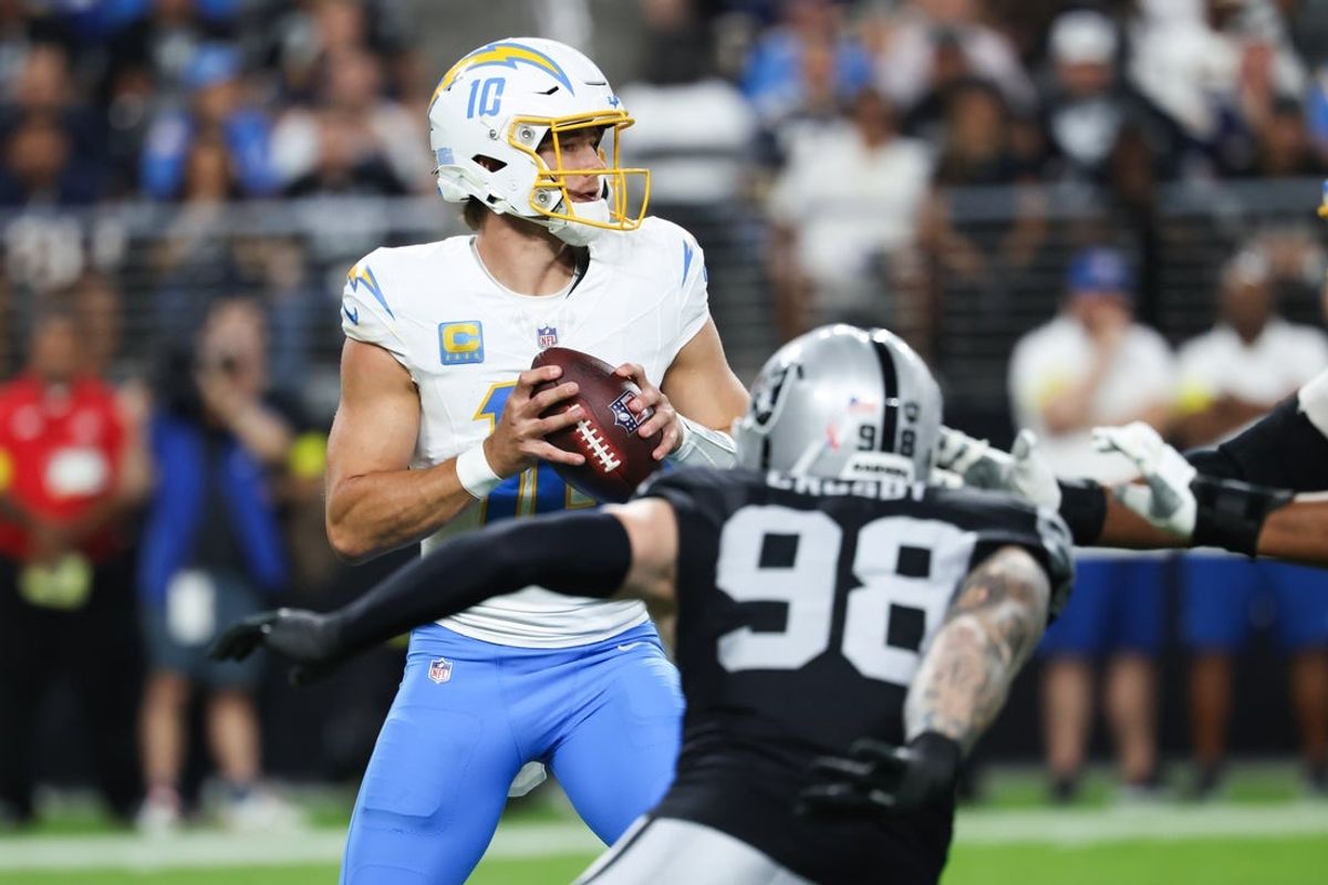 Sep 15, 2025; Paradise, Nevada, USA;  Los Angeles Chargers quarterback Justin Herbert (10) drops back to pass during the first quarter against the Las Vegas Raiders at Allegiant Stadium. Mandatory Credit: Kiyoshi Mio-Imagn Images