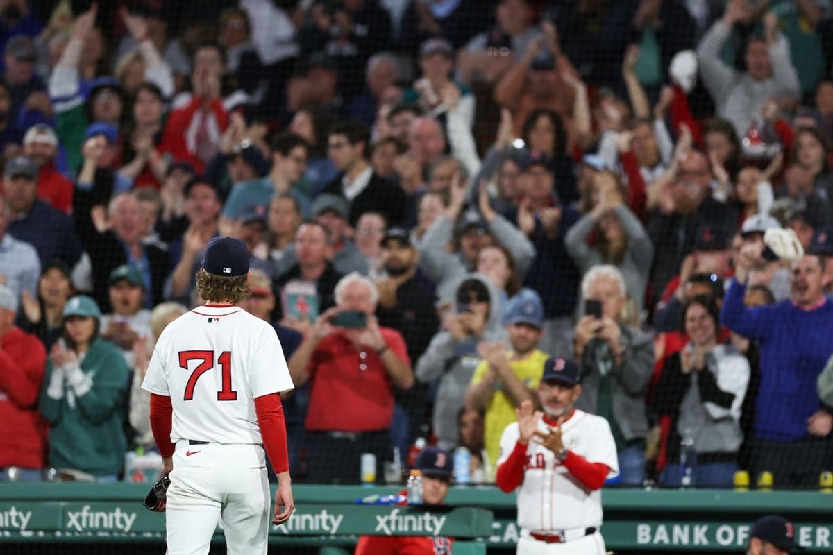 Sep 16, 2025; Boston, Massachusetts, USA; Fans cheer for Boston Red Sox starting pitcher Connelly Early (71) during the sixth inning against the Athletics at Fenway Park. Mandatory Credit: Paul Rutherford-Imagn Images