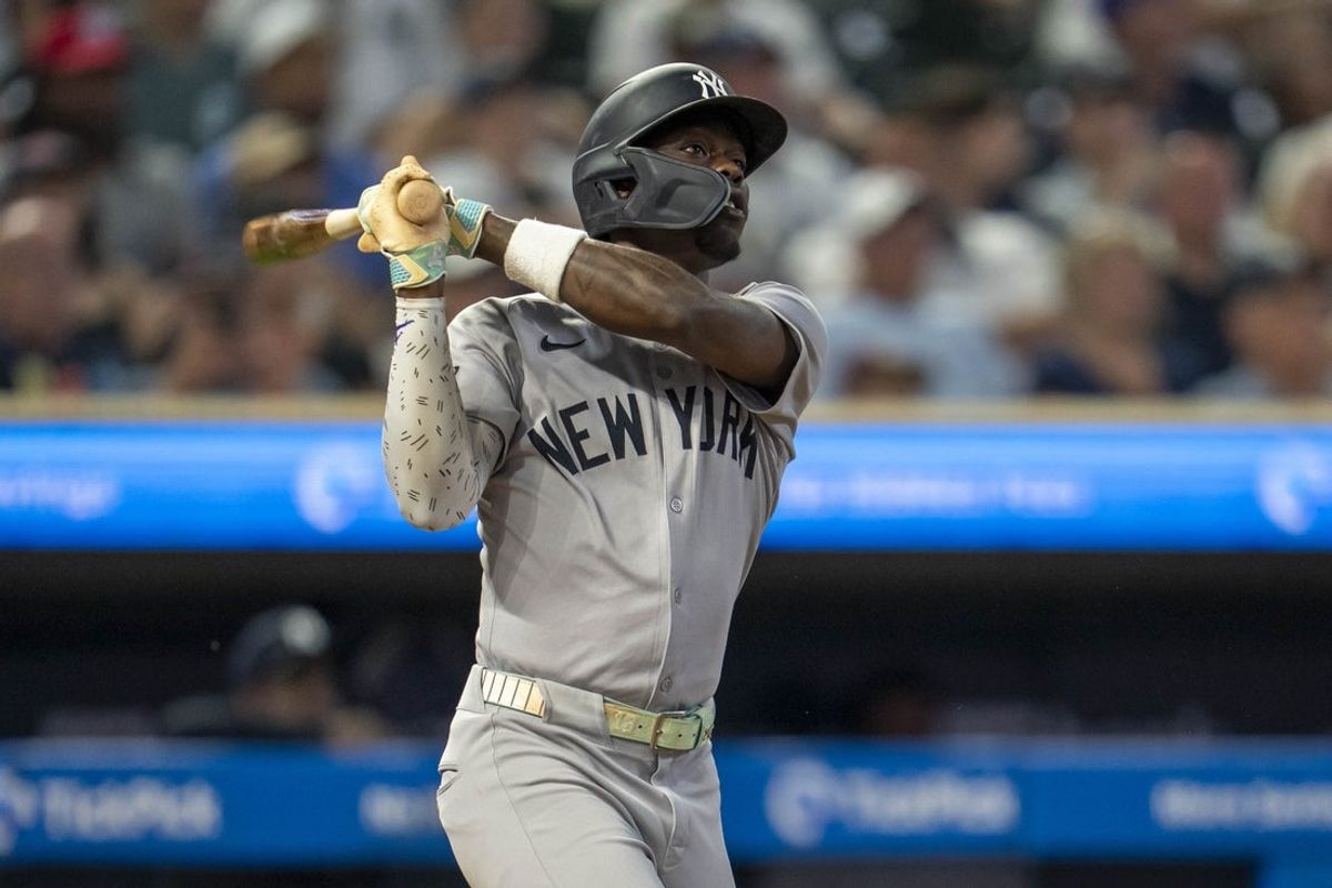 Sep 16, 2025; Minneapolis, Minnesota, USA; New York Yankees second baseman Jazz Chisholm Jr. (13) hits single against the Minnesota Twins in the sixth inning at Target Field. Mandatory Credit: Jesse Johnson-Imagn Images
