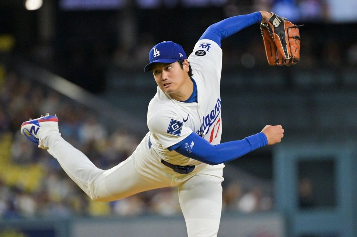 Sep 16, 2025; Los Angeles, California, USA; Los Angeles Dodgers two-way player Shohei Ohtani (17) delivers a pitch during the first inning against the Philadelphia Phillies at Dodger Stadium. Mandatory Credit: Jayne Kamin-Oncea-Imagn Images